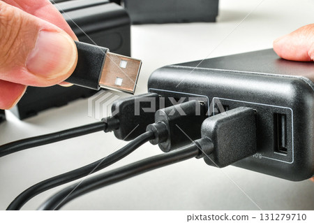 Charging a mobile device Charging a mobile device 131279710