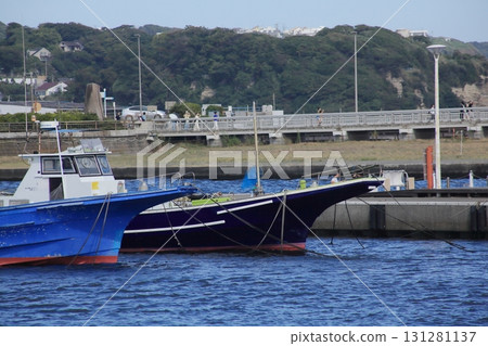 A ship anchored in a harbor in midsummer 131281137