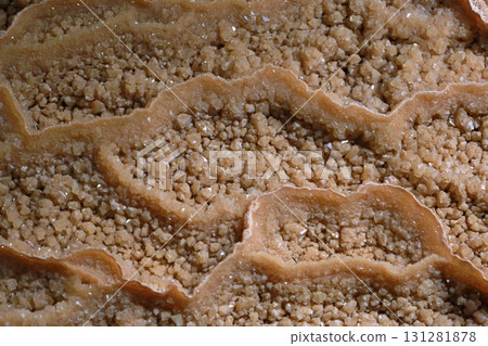 Close-up photo of stalactites on display in a museum Close-up photo of stalactites on display in a museum 131281878