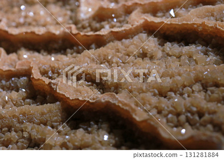 Close-up photo of stalactites on display in a museum 131281884