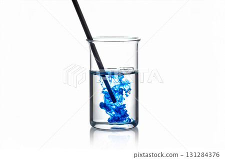a blue liquid poured into a test tube i 131284376