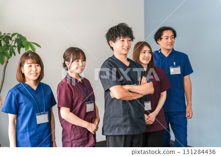 Doctors, caregivers, and osteopaths wearing scrubs Doctors, caregivers, and osteopaths wearing scrubs 131284436