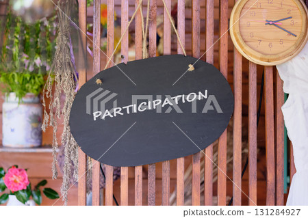 Application advertisement easy and comfortable usage concept, PARTICIPATION written on a decorative wooden board 131284927