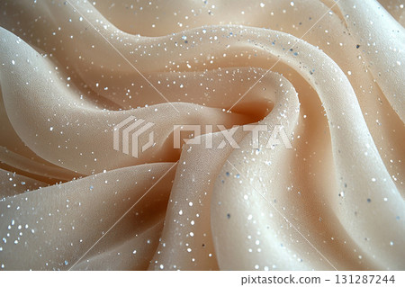 Attract premium clients. Bridal tulle fabric with crystal embellishments on a white background. Attract premium clients. Bridal tulle fabric with crystal embellishments on a white background. 131287244