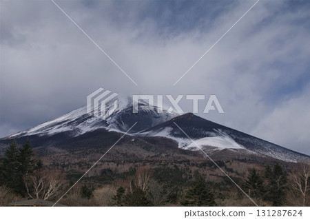The various faces of snow-capped Mount Fuji and its side volcano, Mount Hoei 1 131287624