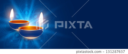 realistic diya diwali blue wallpaper with text space 131287637