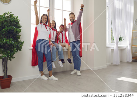 Fun Portrait Of A Family In Superhero Costumes Fun Portrait Of A Family In Superhero Costumes 131288344