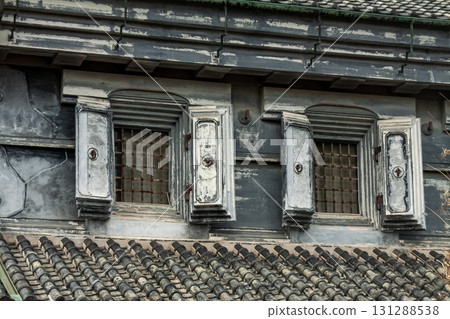 The design of the double-hung windows in a retro storehouse The design of the double-hung windows in a retro storehouse 131288538