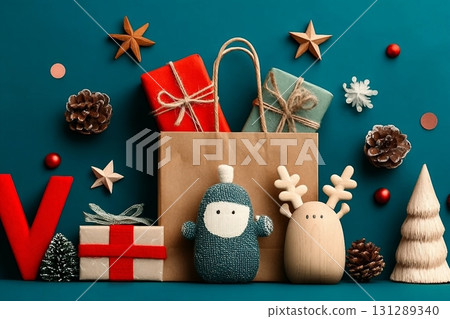 Beautiful composition with Christmas gifts, paper bag and wooden toys on blue background Beautiful composition with Christmas gifts, paper bag and wooden toys on blue background 131289340