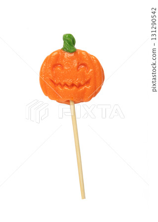 Halloween lollipops shaped like a pumpkin isolated on white background. Festive holiday treats for seasonal celebration Halloween lollipops shaped like a pumpkin isolated on white background. Festive holiday treats for seasonal celebration 131290542