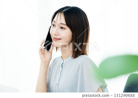 Woman calling in the office 131290688