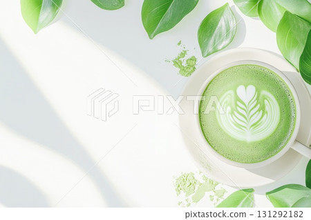 Minimalist matcha latte with leaf art 131292182