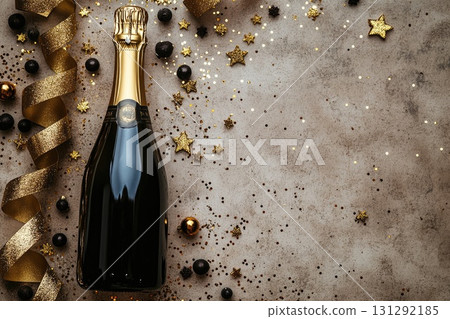 Champagne bottle with golden festive decorations 131292185