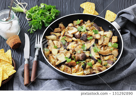 fried wild porcini mushrooms, ceps in skillet fried wild porcini mushrooms, ceps in skillet 131292890