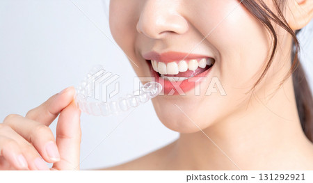 Young woman with a mouthpiece Young woman with a mouthpiece 131292921