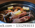 Grilled Seafood Feast on Outdoor Barbecue with Shellfish and Vegetables 131293033