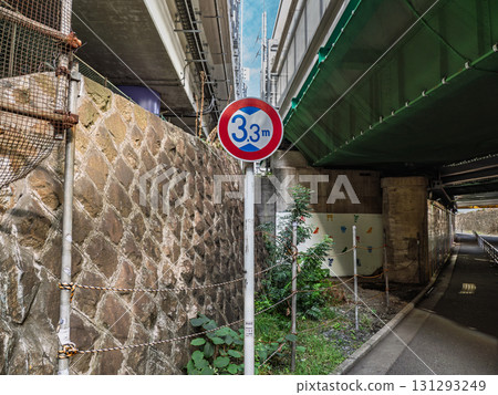 Sign installed on a road intersecting with a railway overpass Regulatory Sign 321 [Height Restriction] 131293249
