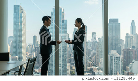 Business meeting in a high-rise office 131293449