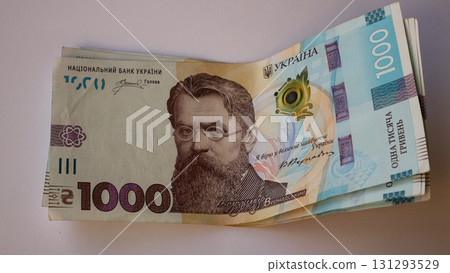 Banknotes with a face value of one thousand Ukrainian hryvnias on the table.  131293529