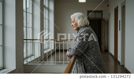 Sad elderly woman feeling deep loneliness, this loneliness fills empty hall 131294272