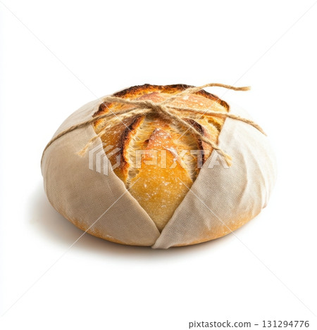 Freshly baked round bread styled in farmhouse aesthetic for food or packaging mockups 131294776