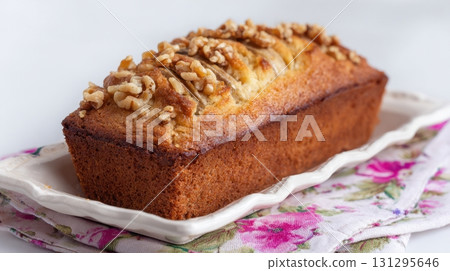 Old-fashioned banana bread illustration for kitchen printables, tags, and cozy designs. 131295646