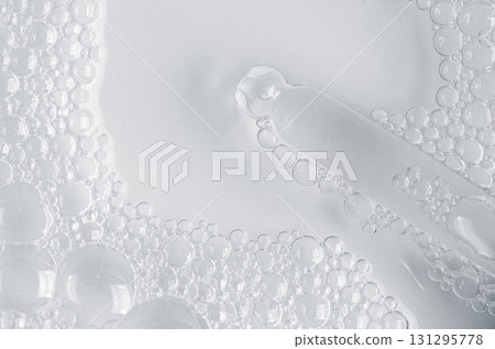 Bubbles of body gel or soap foam or shaving gel. Closeup. Copy space 131295778