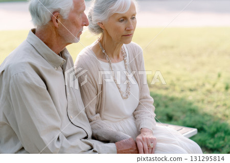 Peaceful moment of forgiveness and unity captured in soft morning light and natural backdrop 131295814