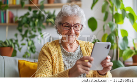 Natural daylight, authentic home interior, and personal digital storytelling. Perfect for modern senior influencer visuals. Natural daylight, authentic home interior, and personal digital storytelling. Perfect for modern senior influencer visuals. 131296081