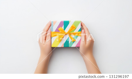 Hands opening colorful blind box on white background, close-up moment of unboxing with emotional tension, perfect for surprise toy themes Hands opening colorful blind box on white background, close-up moment of unboxing with emotional tension, perfect for surprise toy themes 131296197