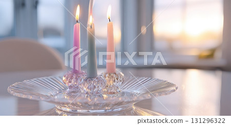 Artistic home styling with crystal candle plate, pastel wax layers, and minimalist soft evening light Artistic home styling with crystal candle plate, pastel wax layers, and minimalist soft evening light 131296322