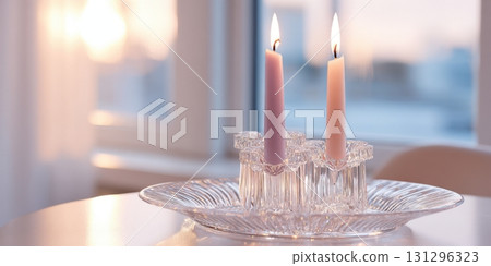Clear glass holders and colorful wax create a serene, decorative atmosphere with slow burning elements 131296323