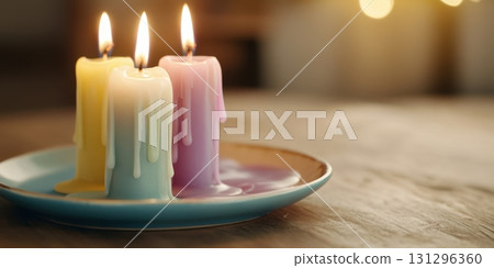 Melting pastel taper candles on a ceramic plate with wax drips, styled in a warm cozy interior for mindful home rituals Melting pastel taper candles on a ceramic plate with wax drips, styled in a warm cozy interior for mindful home rituals 131296360