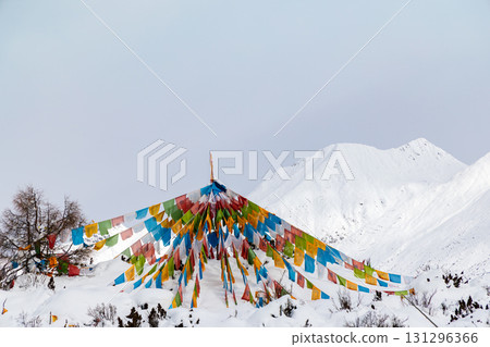 Tibetan prayer flags under the snow-capped mountains 131296366