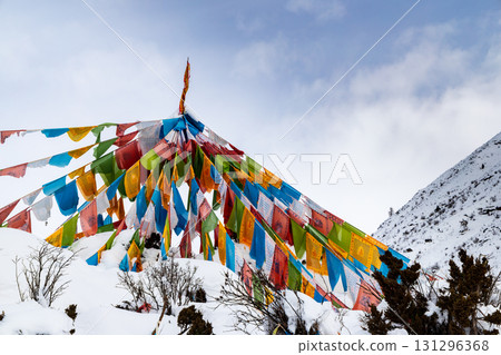 Tibetan prayer flags under the snow-capped mountains 131296368