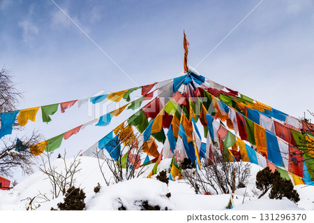 Tibetan prayer flags under the snow-capped mountains 131296370
