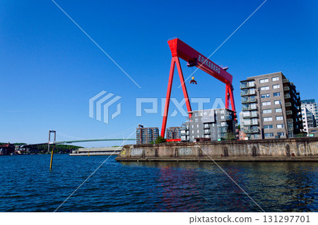 Eriksberg area on Hisingen in Gothenburg, former shipyard with big gantry crane near Alvsborg bridge, Sweden, sunny summer day 131297701