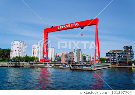 Eriksberg area on Hisingen in Gothenburg, former shipyard with big gantry crane near Alvsborg bridge, Sweden, sunny summer day Eriksberg area on Hisingen in Gothenburg, former shipyard with big gantry crane near Alvsborg bridge, Sweden, sunny summer day 131297704