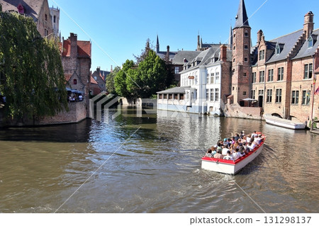 Belgium Bruges historic district canal and old town streets 131298137