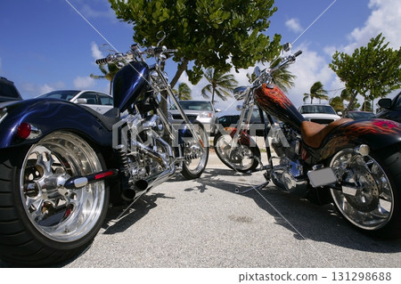 Florida bikes on the beach parking in a sunny summer Florida bikes on the beach parking in a sunny summer 131298688