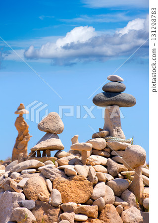 Stone figures on beach shore of Illetes beach in Formentera Stone figures on beach shore of Illetes beach in Formentera 131298783