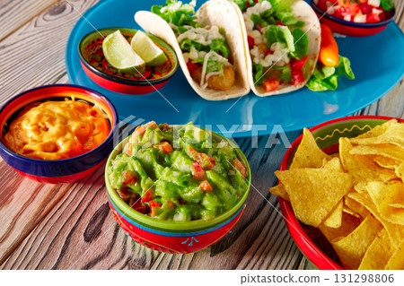 Fish tacos mexican food guacamole nachos and chili Fish tacos mexican food guacamole nachos and chili 131298806