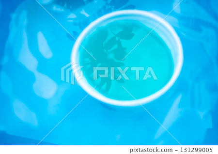 Abstract blue and turquoise water container 131299005