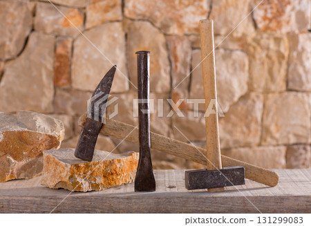 Hammer tools of stonecutter masonry work 131299083