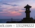 Stone lantern and sunset scenery at Chigogafuchi in Enoshima 131299222