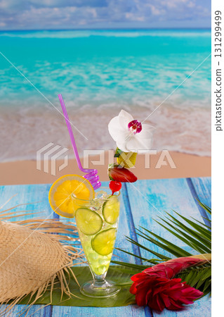 Lemon lime cocktail mojito on tropical beach Lemon lime cocktail mojito on tropical beach 131299499