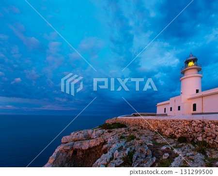Menorca sunset at Faro de Caballeria Lighthouse 131299500