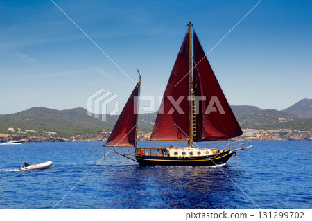 Ibiza Red sails sailboat in Sa Talaia coast 131299702