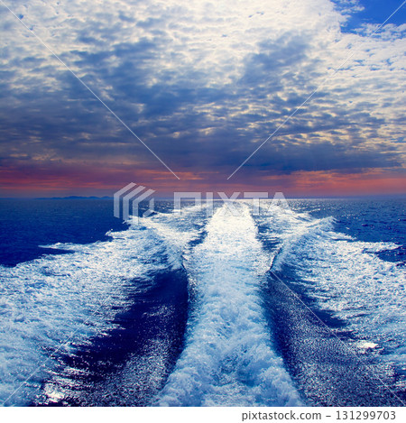 Blue sea with prop wash wake in Ibiza Island Blue sea with prop wash wake in Ibiza Island 131299703
