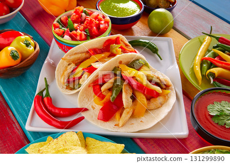 Chicken fajitas tacos mexican food guacamole chili 131299890